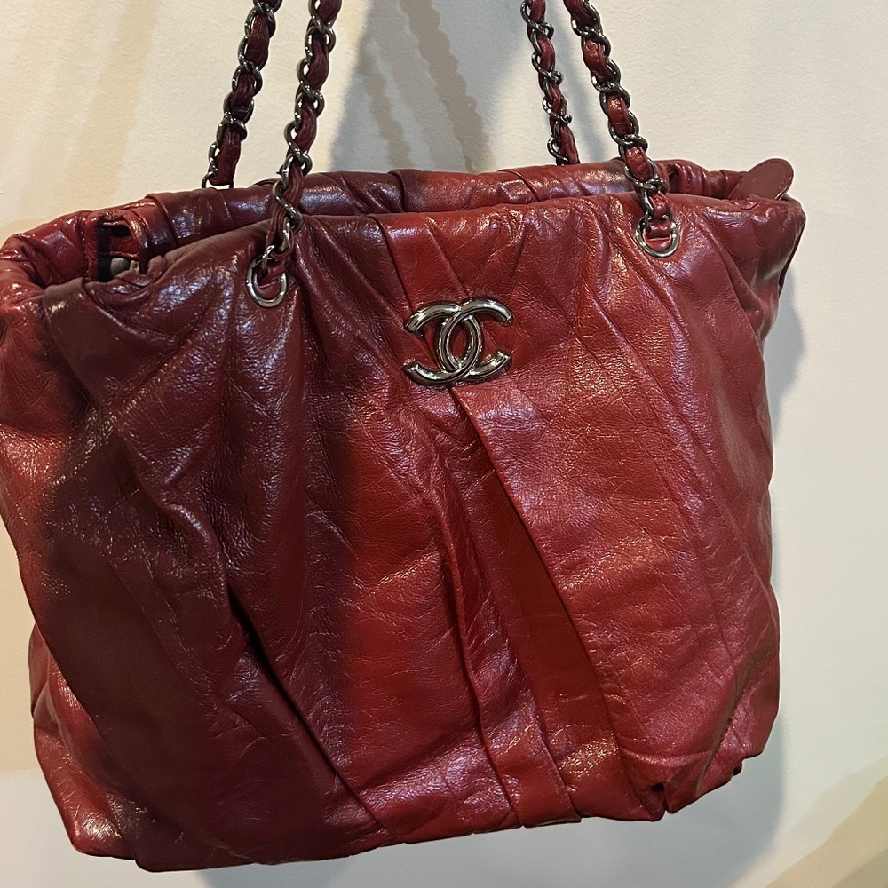 Classic all leather authentic Chanel burgundy shoulder bag.